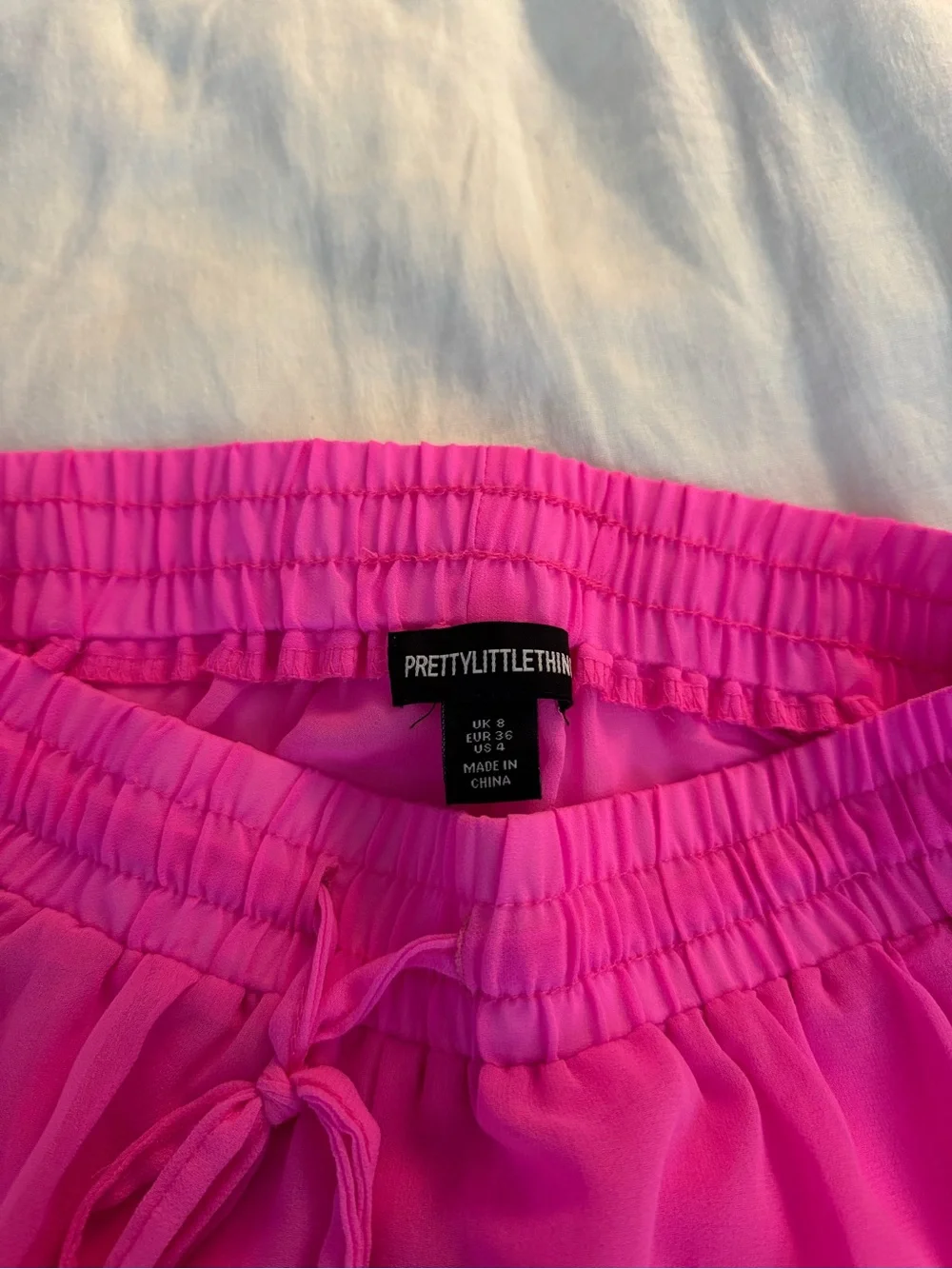 PrettyLittleThing Neon Pink Sheer Swim Coverup Pants